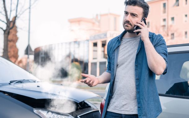 Man Calling for Tow Truck